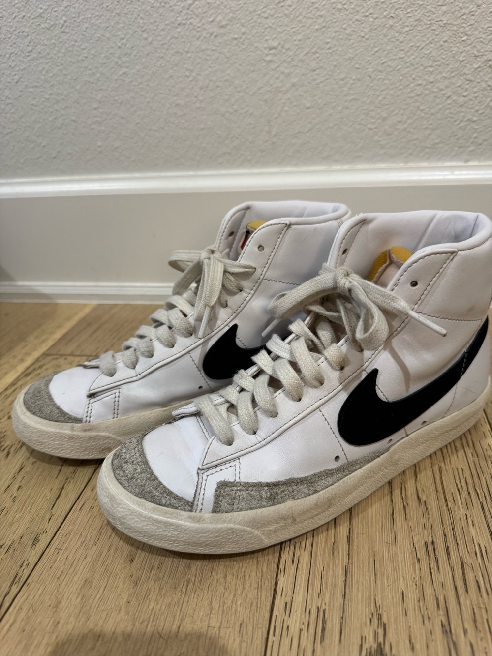 Nike White and Black Mid-Top Swoosh Sneakers